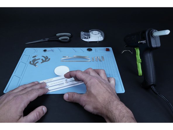 Using a push-pin, poke a hole for each LED leg where shown on the circuit diagram.