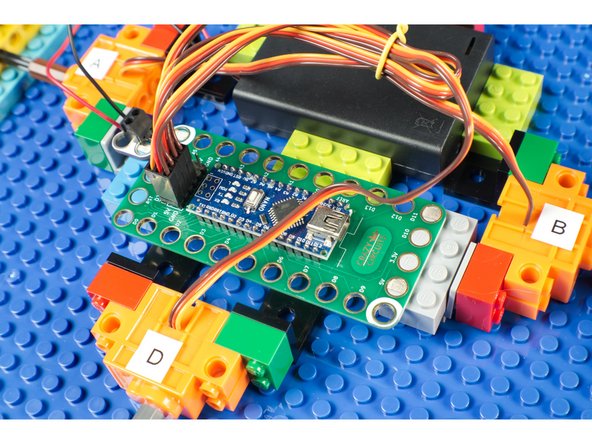 We just stuck the Robotics Board down to a few LEGO bricks to mount it to our robot.