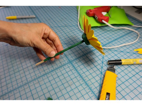 Cover the stem with floral tape as shown.