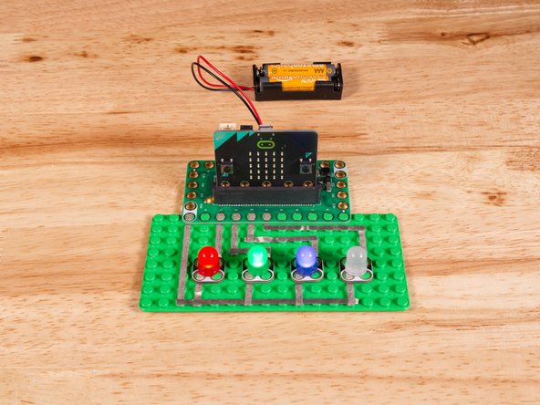 Connect the Positive (+) side of the first LED to Pin 1 on the Bit Board.