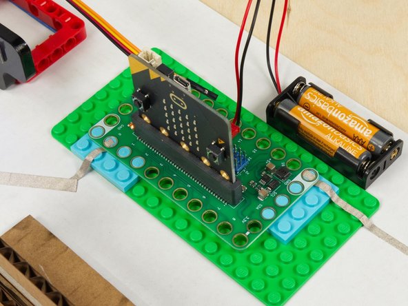 Connect the Bit Board to the LEGO baseplate making sure that the Maker Tape paths connect to Pin 0 and Ground.