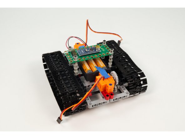 Alternately, you can find a way to mount it to the tank chassis beneath the Robotics Board using LEGO parts, but we thought this method was simple.
