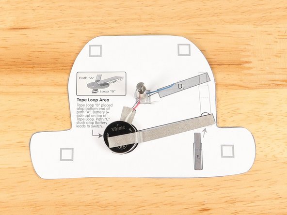Add tape Path C. to the top of the battery and onto the template.