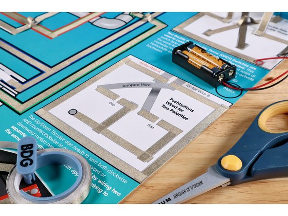 Locate the project template labeled &quot;Pushbuttons Wired For Two Polarities&quot;. It is located on the lower half of the right hand side of the Flat Fish project poster.
