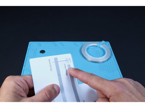 Flip your project over to the circuits side. Bend the LED legs in the directions shown on the diagram so they lay flat against the paper.