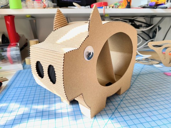 Here are some photos of the front and back of the pig once everything was glued in place. It's looking pretty good! :)