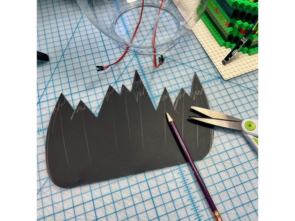 I made mountains from black paper painted with glitter Mod Podge.