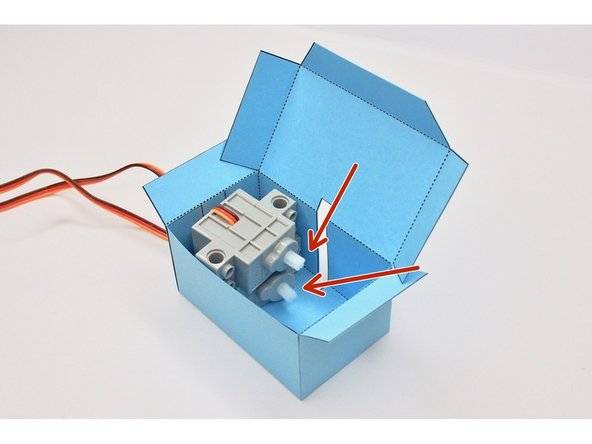 The two servos should stack on top of each other.