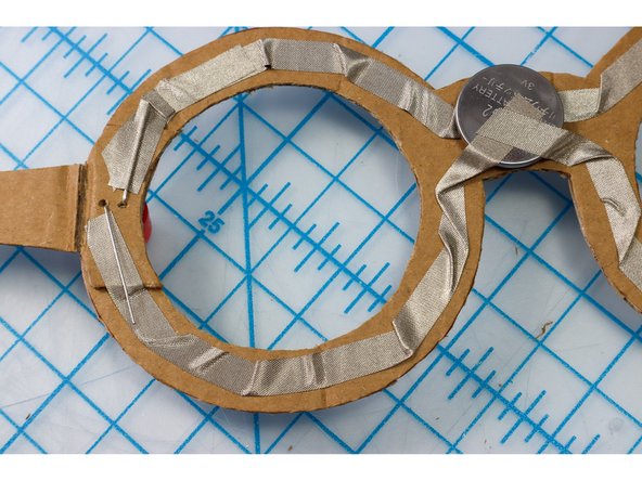 Use a second piece of Maker Tape to connect the LED, and add a piece of Maker Tape on top of the LED's leg, just like the previous step.