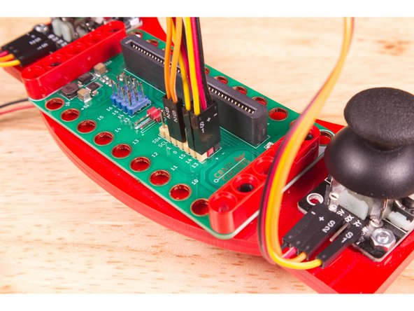 The orange wire (S2) goes into the yellow Pin 1.