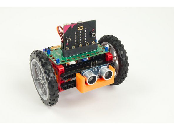 After you have the Distance Sensor Holder mounted to the front of your Rover you can slide the Distance Sensor into place.