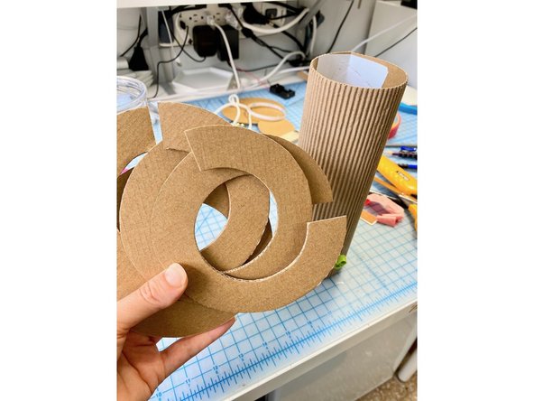 We measured the gumballs (ours were about an inch) and added 1/8th of an inch for some wiggle room.