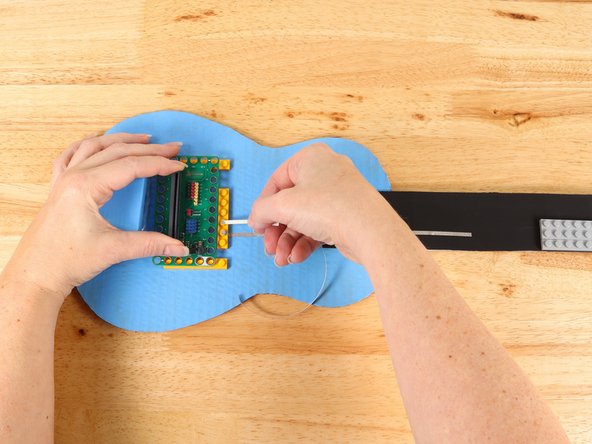 There will be four tape paths going up the neck. These paths cannot touch each other. Make sure to plan your space for each path accordingly.