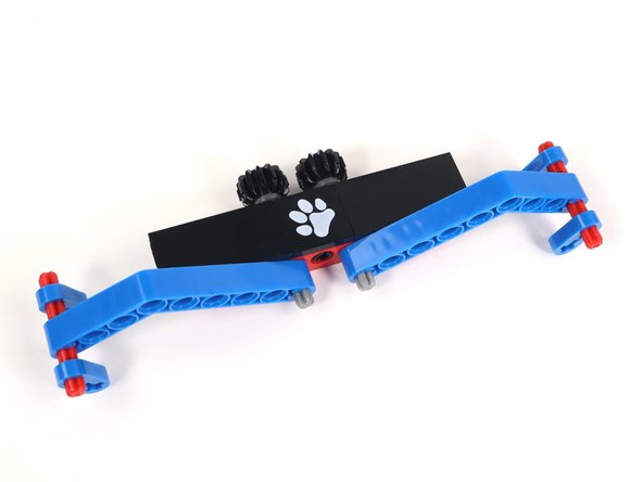 Connect the Claw arms to the axles on Section 3.