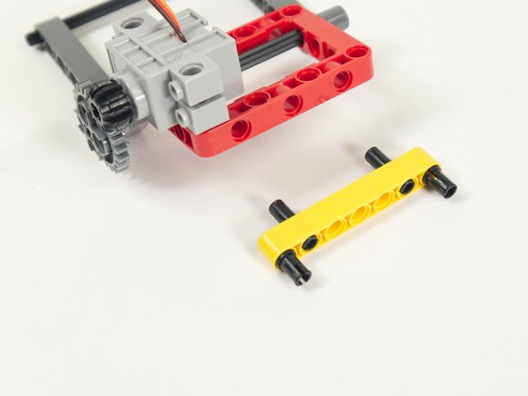 Add the beam to the back of the Lifter's frame.