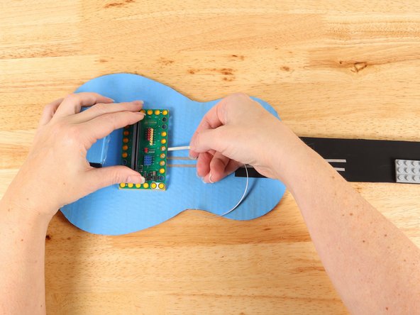 There will be four tape paths going up the neck. These paths cannot touch each other. Make sure to plan your space for each path accordingly.