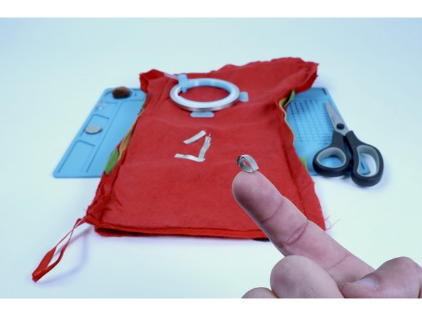 Cut another small piece of Maker Tape and make a tape loop with it.