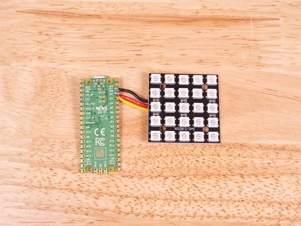 The black wire goes to a GND pin. (We used the one right next to Pin GP2.)