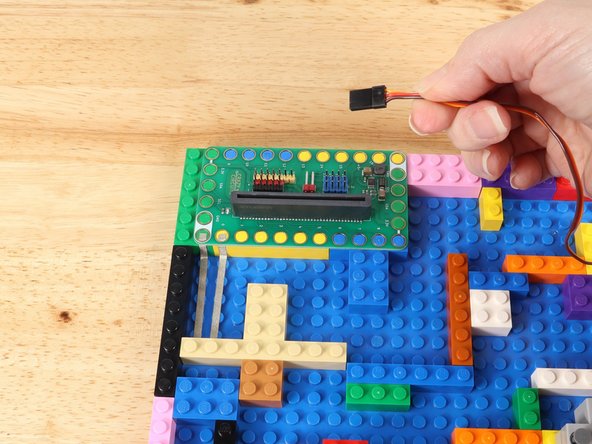 Plug the servo wires into the Bit Board row Pin 13 of the blue pins.