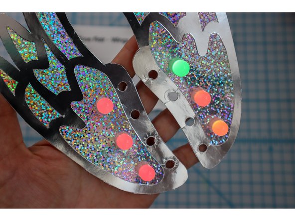 Unlace the shoes, then lace the shoes back up through the holes.