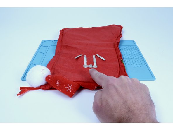 Stick that tape loop to the middle of the tape section you just added.