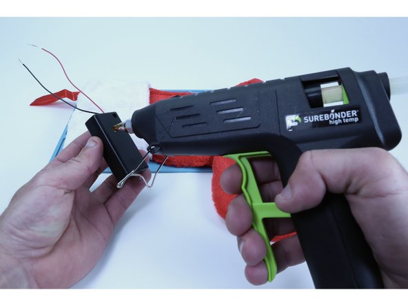 Many stocking are just plain fabric with no existing design. In this version of the project we will add circuit path stripes and a AA battery pack that will allow you to wire and power up as many LEDs as you might care to!