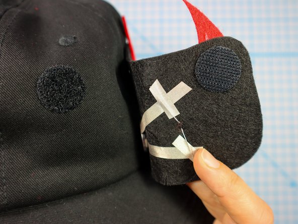 Carefully peel the hook and loop apart and squeeze each dot separately to set the adhesive.