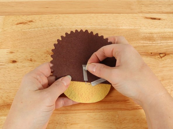 Place another piece of Maker Tape OVER THE TOP of the LED legs so the LED legs have Maker Tape under and on top of them.