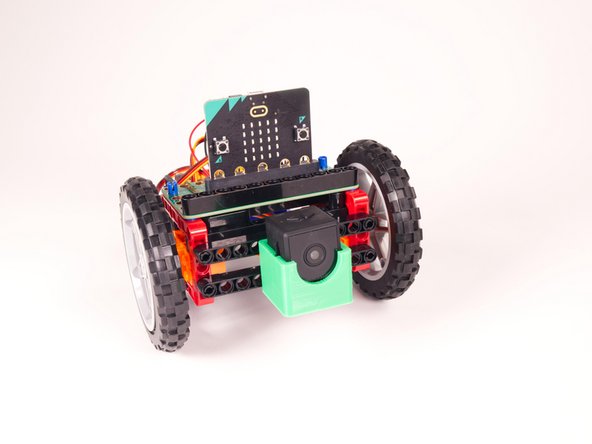 The Spy Camera Mount has LEGO Technic holes on the bottom and the back, so you can easily mount it to any Technic Beam... or the front of your Rover!