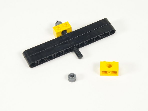 If you don’t have any 1 x 2 bricks with axle holes you can instead use two LEGO Brick 1 x 2 with Hole (3700).