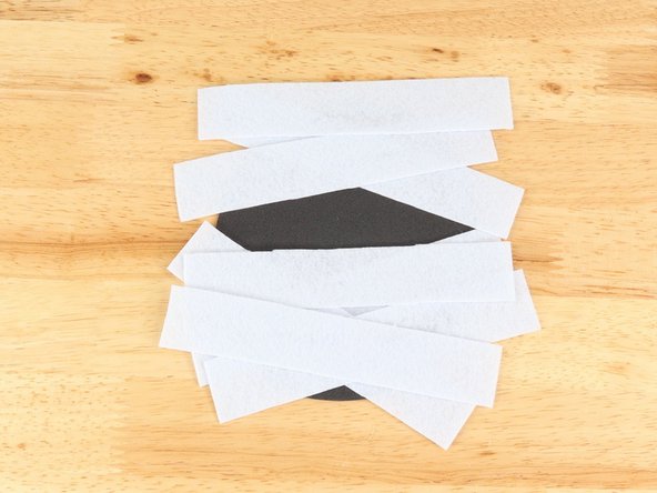 Regular Elmers glue and Tacky glue both work well, but you will need to give the Mummy time to dry overnight before adding the circuit. Hot glue also works well and dries fast so you can build the circuit right away.