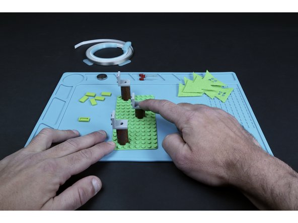 Use the Physical Build Guide found in the docs section to assemble the three tree trunks/baseplate portion of the project.