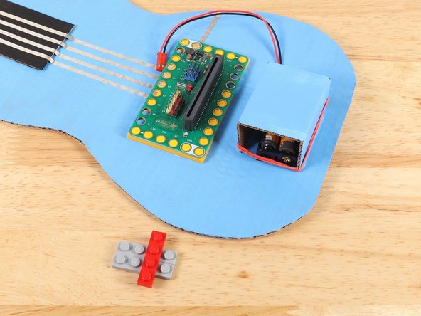 If your LEGO plates are like pictured and are separate parts, hold them together with another LEGO plate to ensure they are aligned properly.