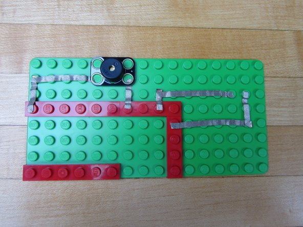 Run a line of Maker Tape from the VIN pin to the blue side of the Screw Terminal.