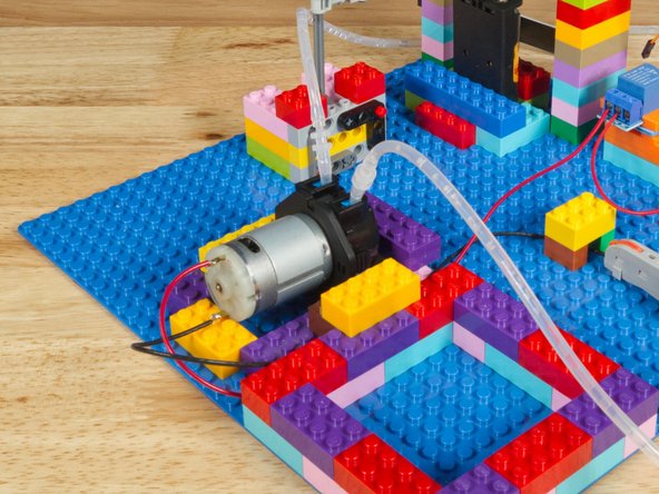 The Relay Module sits between the Battery and the Pump and acts as a &quot;Smart Switch&quot; to turn on the pump by closing the circuit when the micro:bit tells it to.