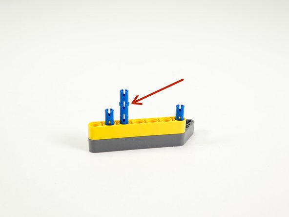 Add another long blue pin. This one goes just to the right of the leftmost pin.