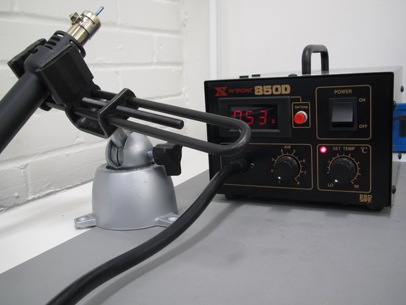 Place the tool in a vice, or have a friend hold the tool pointed away from yourself.