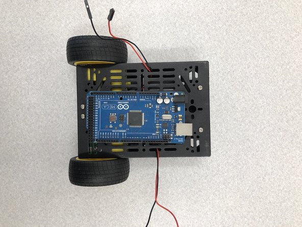NOTE: It is probably most helpful to place the Arduino on the right side of the robot leaving enough space for the LiPo Battery to fit on the left side. Also be sure to keep enough space between the front of the cart and the Arduino ports so you can easily plug and unplug the A-B Cable.