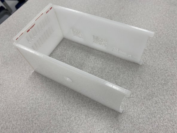 VHB tape is very strong!  Pay attention to the orientation of the back panel before you attach it.  It's a good idea to compare it to the finished PCB to make sure components line up properly.  If you get the orientation wrong, you will have to tear off the back panel and try again.