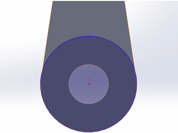 Use the Circle tool to create a circle that is concentric with the existing large circle at the base of the arm.  Be sure to select the top arm face for your new sketch.  Give this new circle a diameter equal to the diameter of the large existing circle.
