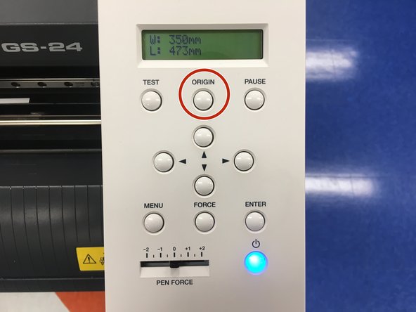 Move the cutting carriage to the far left and advance the material forward by using the arrow keys. This way your sticker will not overlap with your test cut.