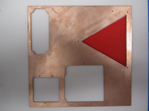 If the copper clad you chose had a firefly board previously routed from it, be sure to use one of the plastic 3D printed triangles in the mill drawer to fill in this hole.