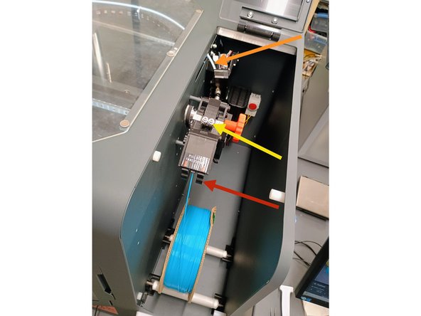 Thread the filament through the extruder using the following steps and image as a reference.