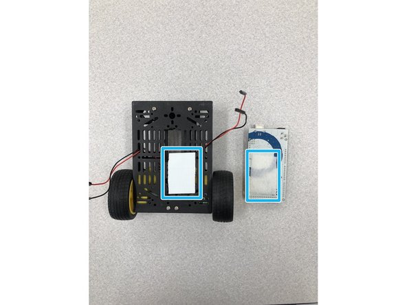 Use the Velcro tape to help fasten the Arduino to the cart to keep it from sliding around.