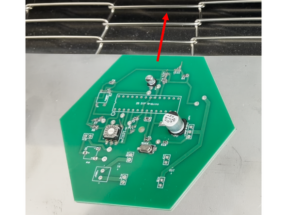 The board enters on the left side of the machine and moves through the three zones to the right.  Place your board on the stainless shelf at the entrance then carefully push it until it is caught by the belt.