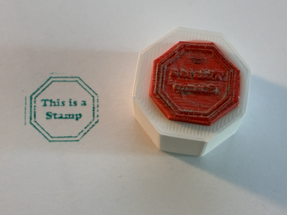 You will need to cut out around the perimeter of the stamp - make sure you only cut the etched part!  See the picture.  You can use regular scissors for this if you are careful.