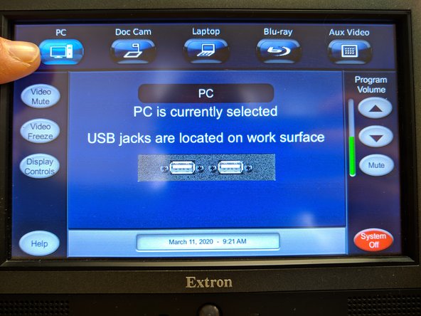 Next, press the PC button in the top left of the Extron screen to choose the computer as the playback source in the room.  You should now able to open your test lecture video and confirm playback.