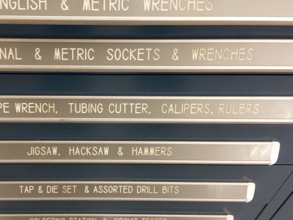 Get a measuring tape or calipers from one of the blue drawers. Make sure to return these once you are done using them.