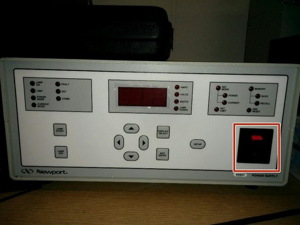 Turn on the solar simulator by moving the switch on the Arc Lamp Power Supply.