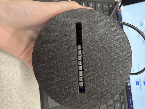 Tape the neopixel stick so that it faces up towards the acrylic slot.